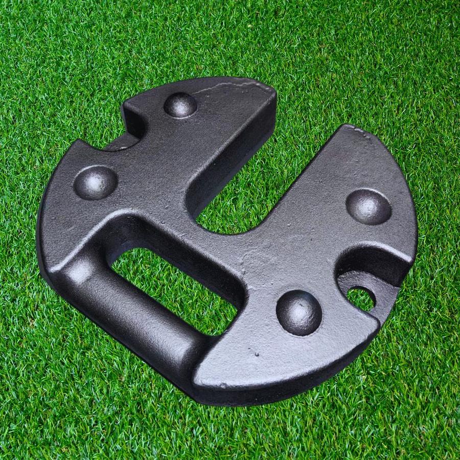 Black 10kg cast metal marquee weight with carry handle and leg slot, on grass